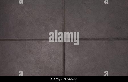 Background texture of textured square floor ceramic tiles. Stock Photo