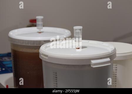 Buckets are widely used by home brewers for fermentation Stock Photo