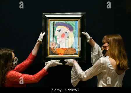 NEW BOND STREET LONDON, UK 24 March 2021. BONHAMS PHOTOCALL: MAJOR PICASSO PORTRAIT UNSEEN FOR 40 YEARS. Femme au Béret Mauve, 1937 by Pablo Picasso. Estimate: $10,000,000-15,000,000  - The Picasso portrait, unseen for nearly 40 years, is being shown in cities around the world before being offered for sale at Bonhams Impressionist and Modern Art sale in New York on Thursday 13 May. Credit amer ghazzal/Alamy Live News Stock Photo