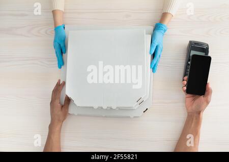 Contactless payment and health protection during covid-19 quarantine Stock Photo