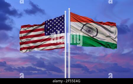 flag of America with India flag on sky background Stock Photo
