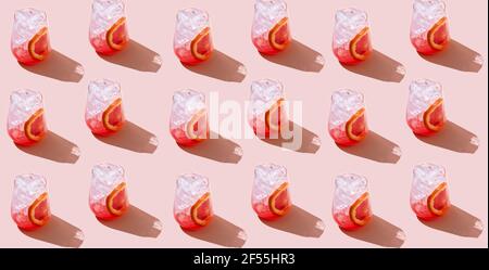 Seamless pattern made of cocktail from sicilian oranges. Eating concept. Creative minimal summer idea. Stock Photo