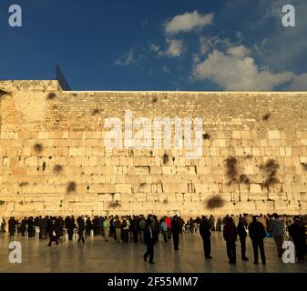 Israel Jerusalem Western Wall or Wailing Wall with worshippers Stock Photo