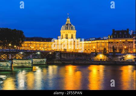 night scene of National Residence of the Invalids and the pont des arts Stock Photo