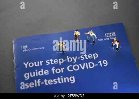 A COVID-19 Self Test (Rapid Antigen Test) kit information concept image. Selective focus. Stock Photo