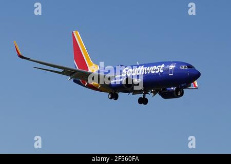 A Southwest Airlines Boeing 737-700 twin-jet airplane registration N47OWN lands at the Hollywood Burbank Airport, Tuesday, March 24, 2021, in Burbank, Stock Photo