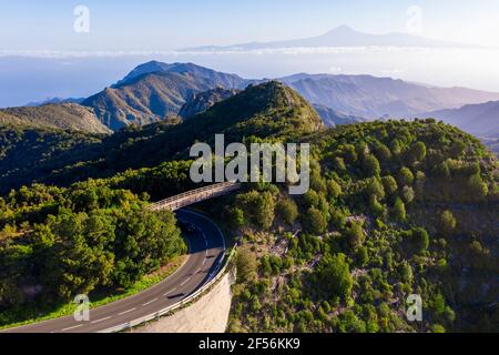 Drone view of bridge spanning over highway in Garajonay National Park Stock Photo