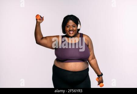 Young woman making pilates and functional training at the gym. Concept about sport, fitness and weight loss Stock Photo