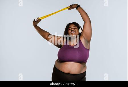 Young woman making pilates and functional training at the gym. Concept about sport, fitness and weight loss Stock Photo