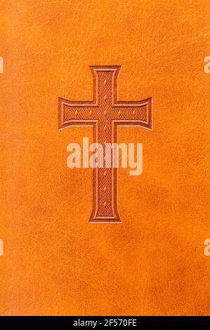 Holy Bible Cover with Cross and Leather Texture Background. Stock Photo