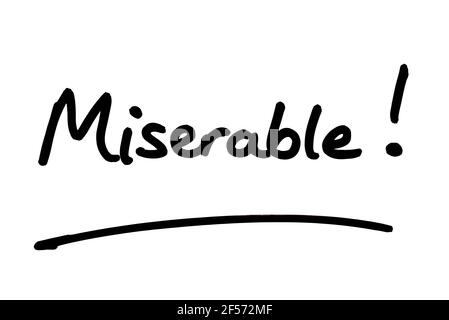 Miserable! handwritten on a white background. Stock Photo