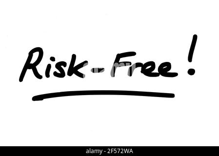 Risk-Free! handwritten on a white background. Stock Photo