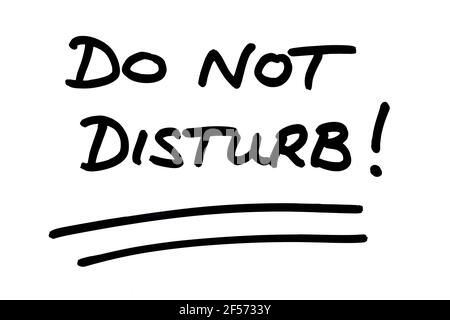 DO NOT DISTURB! handwritten on a white background. Stock Photo