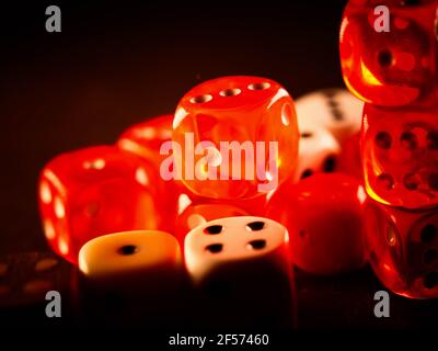 Creative background, roulette, gaming dice, cards, casino chips on a dark background. The concept of gambling, casino, winnings, Vegas Games Backgroun Stock Photo