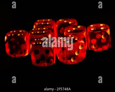 Creative background, roulette, gaming dice, cards, casino chips on a dark background. The concept of gambling, casino, winnings, Vegas Games Backgroun Stock Photo