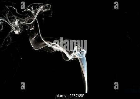 Grey smoke abstract texture, isolated effect with dark background Stock Photo