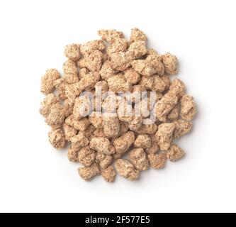 Top view of wheat bran pellets isolated on white Stock Photo