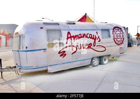 Airstream trailer made into mobile Diner with name Amancay's Diner, located on the corner on Morgan Avenue in Brooklyn, New York, USA Street food Stock Photo
