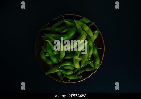Green and Fresh Edamame on a Plate Stock Photo