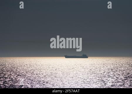 Lonely fishing ship trawler boat on ocean Stock Photo