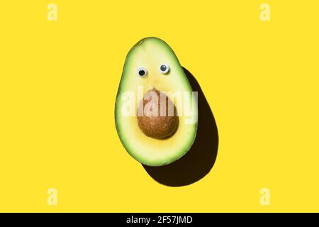 Concept of censorship avocado with a seed and eyes Stock Photo