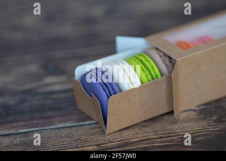 Colored macaroon cakes in a paper box Stock Photo