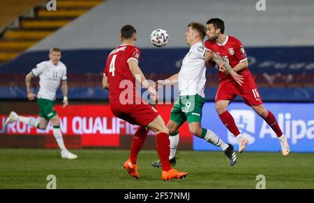 Serbia's Milan Gajic (right) battles with Republic of Ireland's James Collins during the 2022 FIFA World Cup Qualifying match at the Rajko Mitic Stadium in Belgrade, Serbia. Picture date: Wednesday March 24, 2021. Stock Photo