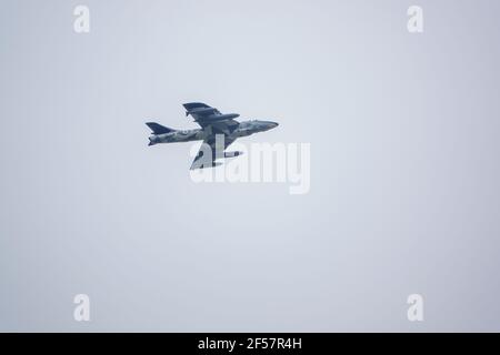 ZZ191 (ex G-HHAD, G-BWFS, J-4058) F.58 hawker hunter jet fighter in low level flight, grey sky Stock Photo