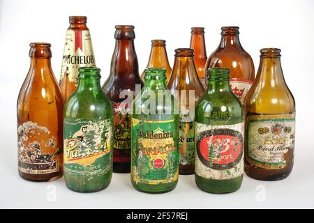 Old degraded glass beer bottles Stock Photo