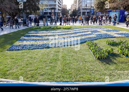 A Greek flag made of blue and white flowers at Syntagma Square, Athens, during the celebrations for the 200 years since the Greek Independence War. Stock Photo