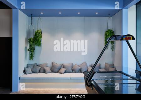 View from Air Hockey table in games room to seating area. Calico Student Accommodation, Liverpool, United Kingdom. Architect: Naomi Cleaver , 2020. Stock Photo