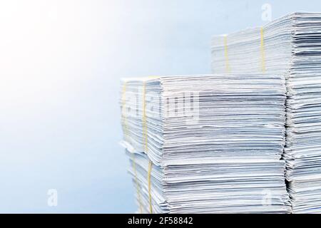stack of documents on desktop in office. Stock Photo