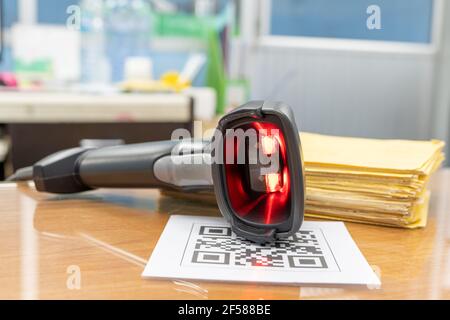Barcode reader for convert QR Code or Documents to data into the computer. Stock Photo