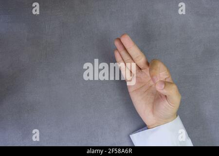 play the role of being an Businessman with five three on imitation concrete background Stock Photo