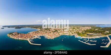 Aerial panorama of the Rovinj old town and harbor in Istria by the Adriatic sea in Croatia on a sunny summer day