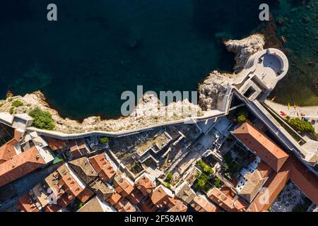 Top down view of the Dubrovnik old town fortified wall overlooking the Adriatic sea in Croatia Stock Photo