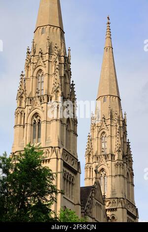 The closed up view of the bell towers of Saint Paul Cathedral in Oakland neighborhood.Pittsburgh.Pennsylvania.USA Stock Photo