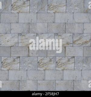 White-gray with brown streaks. Seamless texture of marble tiles on the wall. Stock Photo