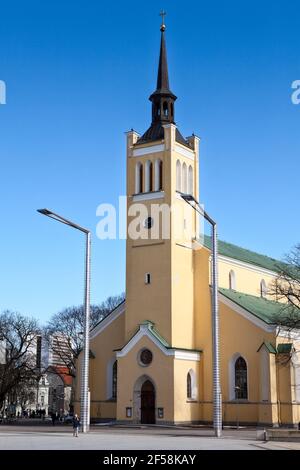 Building and clock tower of the St. John's Church (Jaani kirik). Facade and main entrance. It is a large Lutheran parish church in Tallinn. Estonia Stock Photo