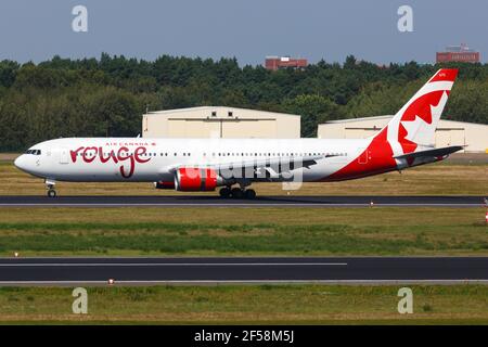 Berlin, Germany – 30. August 2017: Air Canada Rouge Boeing 767 at Berlin Tegel airport (TXL) in Germany. Boeing is an aircraft manufacturer based in S Stock Photo
