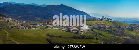 Two Kojsko Churches  Panorama on Nearby Area. Wide View on Cultivated Area on Early Spring Day. Front View. Stock Photo