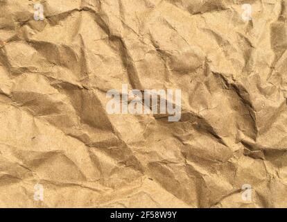 Brown wrinkle recycle paper background for Design. Blank  surface for text or work Stock Photo
