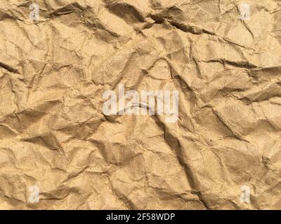Brown wrinkle recycle paper background for Design. Blank  surface for text or work Stock Photo