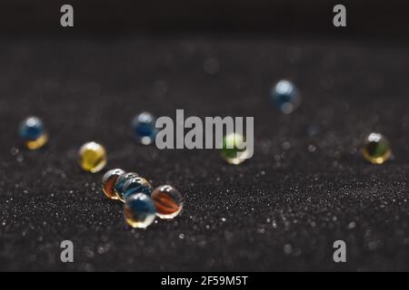 Handful of Red Marbles Stock Photo - Alamy