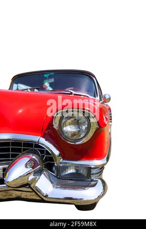 Close view of a classic red, white and blue barber pole mounted outside ...