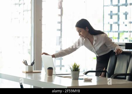 Young asian woman working laptop for business or online learning. Stock Photo