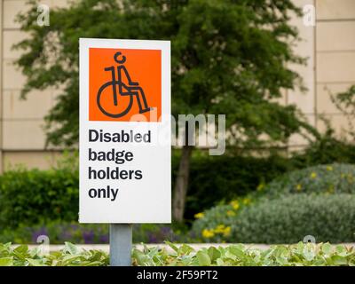 A Disabled Badge Holders Only sign in car park at The Mall shopping centre at Cribbs Causeway near Bristol, England. Stock Photo