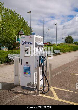 An electric vehicle charging point at The Mall shopping centre at Cribbs Causeway near Bristol, England. Stock Photo