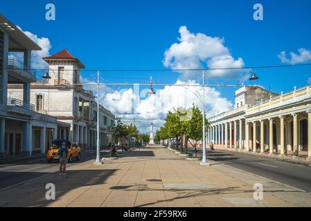 October 30, 2019: Street scene of Paseo del Prado, the main street of Cienfuegos and the longest street in Cuba with about 2 kilometers of length. It Stock Photo