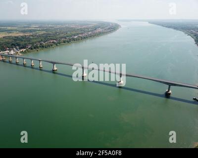 (210325) -- PHNOM PENH, March 25, 2021 (Xinhua) -- Aerial photo taken on March 11, 2021 shows the eighth Cambodia-China Friendship Bridge across the Mekong River, connecting Kampong Cham province and Tboung Khmum province in southeastern Cambodia. Construction work on the eighth Cambodia-China Friendship Bridge was completed earlier than schedule despite the COVID-19 pandemic, Cambodian Minister of Public Works and Transport Sun Chanthol said on Tuesday. (Shanghai Construction Group/Handout via Xinhua) Stock Photo